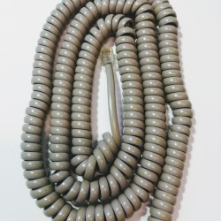 Καλώδιο προεκτάσεως σπιράλ τηλεφωνου 1μέτρο / γκρί - USA - 4P4C - CENTRAL 